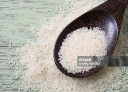 Rice in wooden spoon